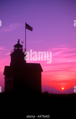 Holland Michigan Lighthouse at sunset on the shores of Lake Michigan Stock Photo
