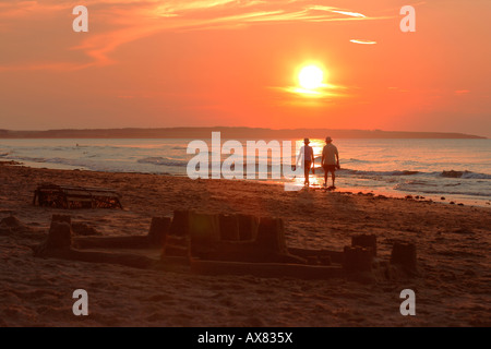 Cavendish Beach, Prince Edward Island, pei, Canada, with a sunset and beach walkers Stock Photo