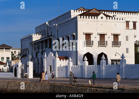 People in front of the former Sultan's palace, Zanzibar, Tanzania, Africa Stock Photo