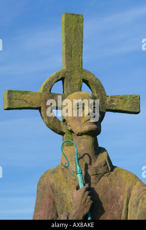 Statue of St Aidan in the grounds of the Parish Church of St Mary the Virgin, Holy Island, Northumberland, England Stock Photo