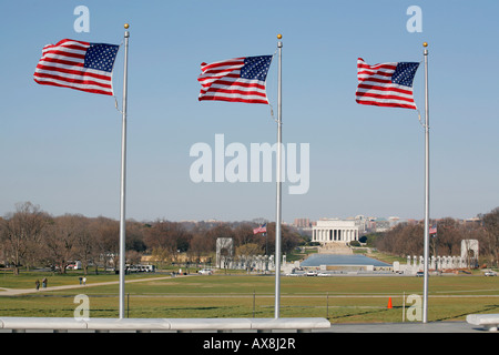 American flags near Washington Monument, Lincoln memorial on the background, Washington DC, USA Stock Photo