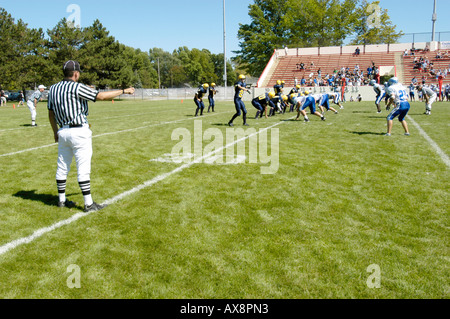 American High School Football Action referee Stock Photo