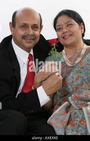 Portrait of a senior couple celebrating their anniversary and smiling Stock Photo