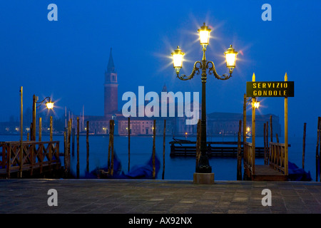 san marco square and gondolas at dawn looking across to san giorgio maggiore island and lagoon,venice,Italy,Europe. Stock Photo