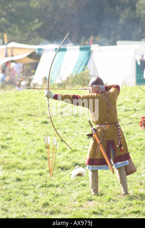 medieval english archer about to loose an arrow  battle of hastings east sussex england Stock Photo