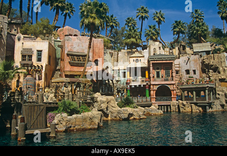 Buildings behind lake in front of Treasure Island Hotel and Casino, Las Vegas, Nevada, USA Stock Photo