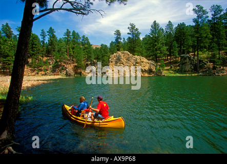 people, mother, father, children, family, canoe, canoe ride, canoeing, canoeing on lake, family vacation, Custer State Park, Black Hills, South Dakota Stock Photo