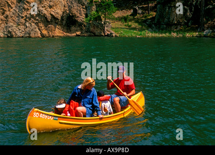 people, mother, father, children, family, canoe, canoe ride, canoeing, canoeing on lake, family vacation, Custer State Park, Black Hills, South Dakota Stock Photo