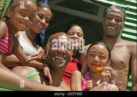 Family in a changing room at St. James Beach, Cape Peninsula, Western Cape, South Africa Stock Photo