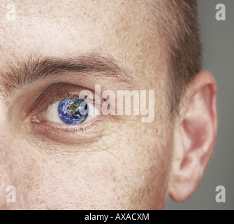 Close up view of a mans face showing a deep blue eye Stock Photo