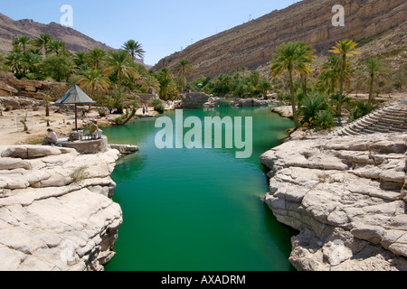 The turquoise pools of Wadi Bani Khalid in the eastern Hajar mountains (Al Hajar ash sharqi) in the Sultanate of Oman. Stock Photo