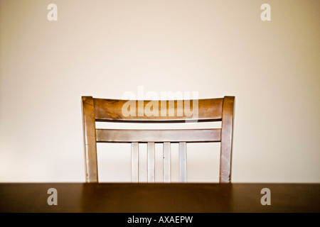 Wooden Chair at table simple symmetry Stock Photo