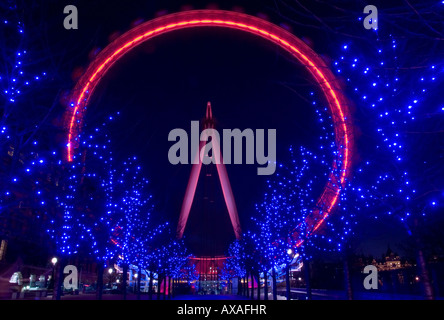 The London Eye taken at night from the Embankment on the South Bank of London Stock Photo