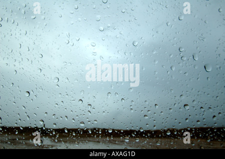 Raindrops on car windshield Stock Photo