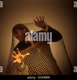 Trapped in the net, internet anxiety Stock Photo
