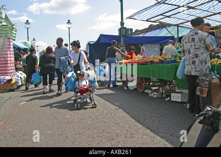 Shoppers in Ridley Road Market Dalston Hackney East London GB UK Stock Photo