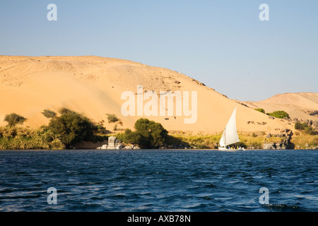 Felucca boat sailing on the River Nile Aswan Upper Egypt North Africa Middle East Stock Photo