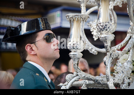 A Civil Guard escorting a float with the Virgin image, Seville, Spain, Holy Week 2008 Stock Photo