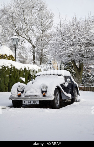 Morgan Sports Car covered in snow Stock Photo