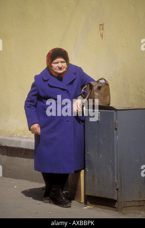 Old lady standing on street, Moscow, Russia Stock Photo