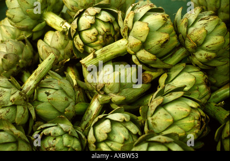 Food Globe Artichokes on market stall Stock Photo