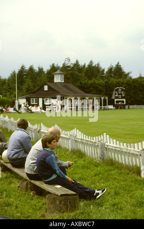 UK Wales Clwyd sport Marchweil Hall cricket ground spectators and pavilion Stock Photo