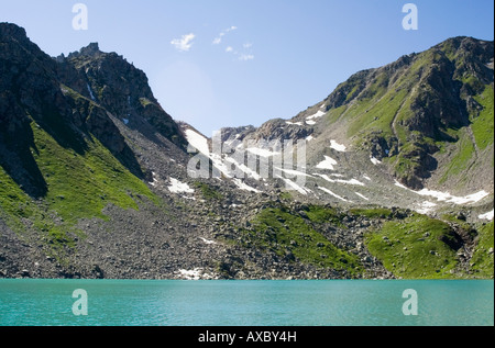 Lake Sruer with the Vannino Pass in the back, Italian Alps Stock Photo
