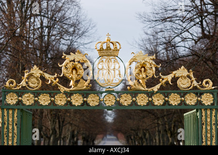 Detail of gate at the entrance to the gardens at Drottningholm Palace near Stockholm. Winter background. Stock Photo