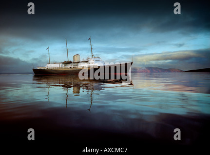 The last days. The Royal Yacht Britannia sailing off the West Coast of Scotland during her farewell tour of the United Kingdom in 1997. Stock Photo