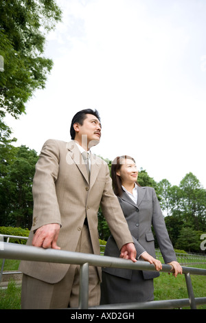 Two business people standing Stock Photo