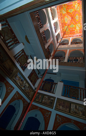 Vertical wide angle of the highly opulent interior of a traditionally decorated Moorish styled riad. Stock Photo