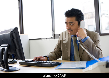 Businessman working in Office Stock Photo