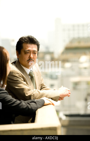 Two business people talking Stock Photo