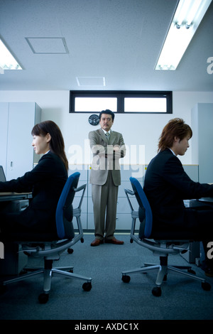 Three people working in office Stock Photo