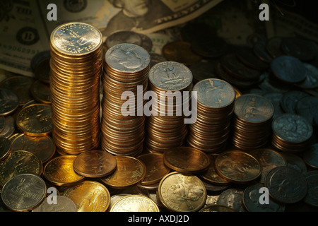 Stacks of Coins along with Money US Money. Wealth concept Stock Photo