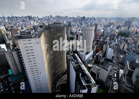 Skyline of São Paulo, Brazil. In the Forground the wafe shaped skyskraper COPAN of Architect Oscar Niemeyer Stock Photo