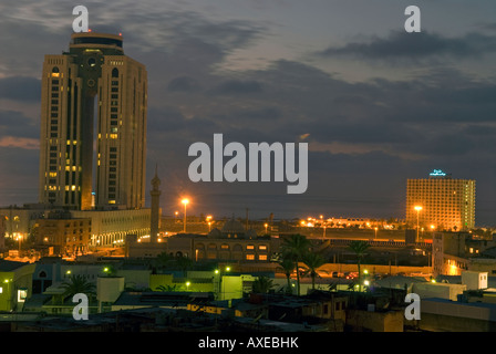 General view of the city of Tripoli by night showing the Al Fateh Tower Tripoli Libya Stock Photo