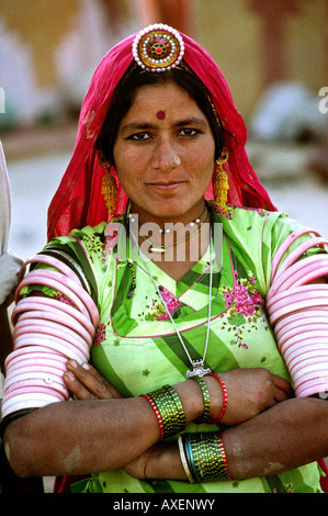 India Rajasthan crafts jewellery bejewelled Rajasthani village woman near Khuri Village Stock Photo
