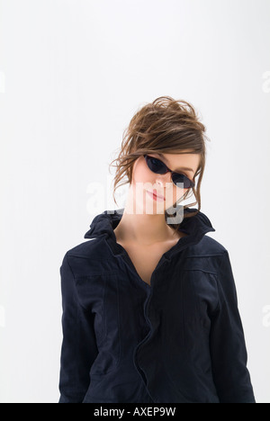 Portrait of young woman wearing sunglasses Stock Photo