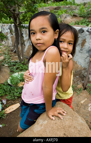 Girl child poor Bali poverty sad challenged extreme hold feed poor ...