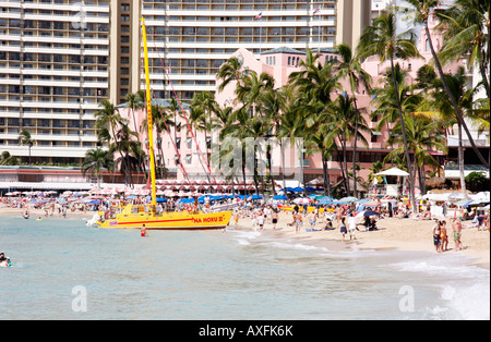 The iconic Royal Hawaiian Hotel is on Waikiki beach and is known as the Pink Palace of the Pacific Stock Photo