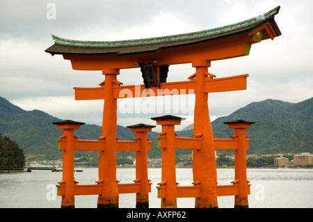 The floating torii gate of Miyajima stands in the bay near the Itsukushima Shrine Stock Photo