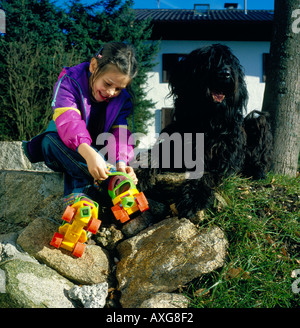 young girl puts on her roller skates. Photo by Willy Matheisl Stock Photo