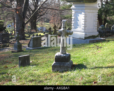 Cross marking a grave in the Mount Auburn cemetery Cambridge, Mass Stock Photo