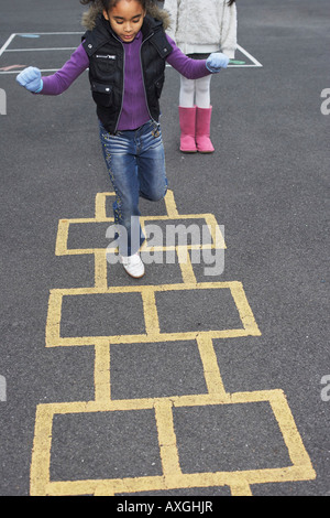 playing hop scotch