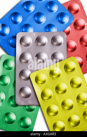 Tablet sachets of different colours Stock Photo