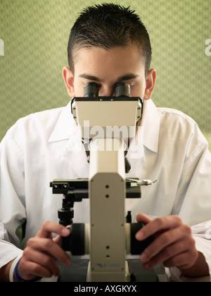 Scientist Using Microscope Stock Photo