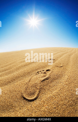Footprints in Desert Sand Stock Photo