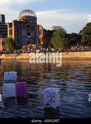 Floating lanterns on August 6th, Hiroshima, Japan. Placed in the river beside the A-Bomb Dome ( a UNESCO World Heritage Site. ) Stock Photo