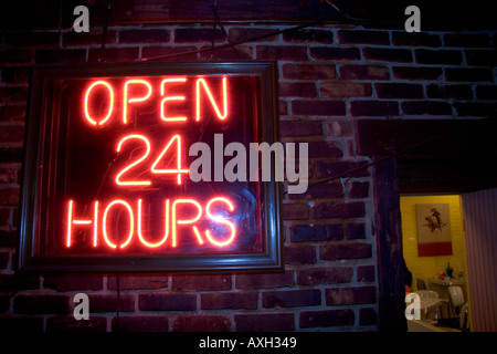 Open 24 hours neon sign Stock Photo